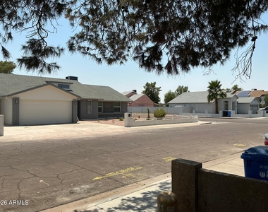 8837 W Highland Avenue - Photo Thumbnail 1