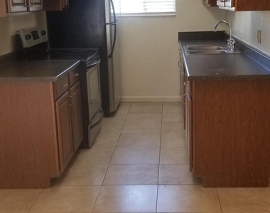 1416 S Jentilly Lane - Photo Thumbnail 1
