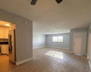 5861 Nw 16th Place - Photo Thumbnail 1