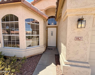9821 W Yukon Drive - Photo Thumbnail 2