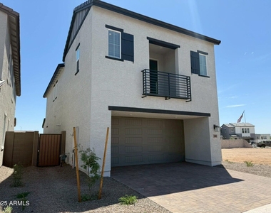 2443 W Rowel Road - Photo Thumbnail 1