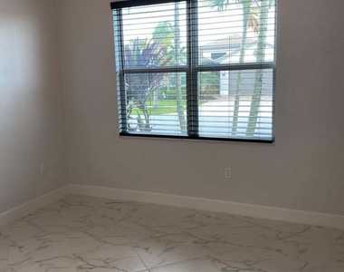 12049 Sw Jasper Lake Way - Photo Thumbnail 9
