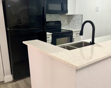 2820 N Oakland Forest Drive - Photo Thumbnail 1