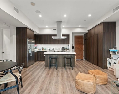 556 N Flores Street - Photo Thumbnail 2