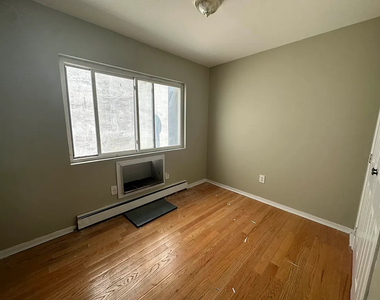 1027 Halsey Street - Photo Thumbnail 5