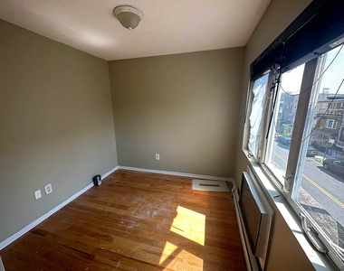 1027 Halsey Street - Photo Thumbnail 3