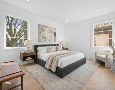 214-31 39th Avenue - Photo Thumbnail 3