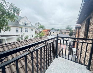 214-31 39th Avenue - Photo Thumbnail 10
