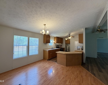 8000 Peach Blossom Lane - Photo Thumbnail 3