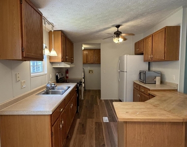 8000 Peach Blossom Lane - Photo Thumbnail 4