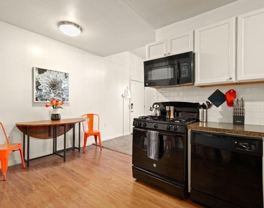 302 E 30th St - Photo Thumbnail 4