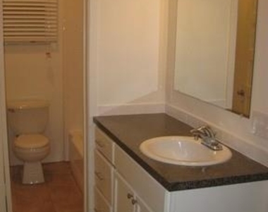 302 E 30th St - Photo Thumbnail 3