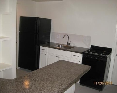 302 E 30th St - Photo Thumbnail 5