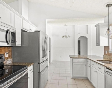 10334 Triple Crown Avenue - Photo Thumbnail 10