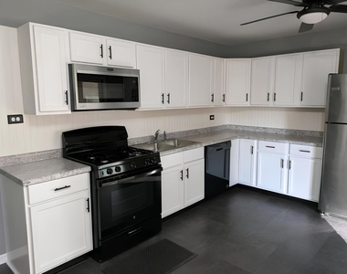 9407 Elm Avenue - Photo Thumbnail 1