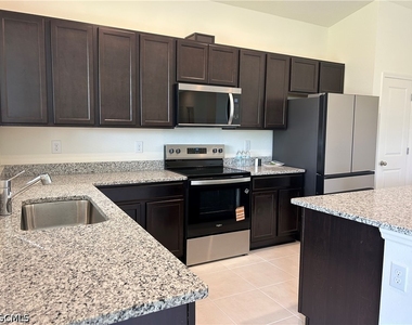 6548 Estero Bay Drive - Photo Thumbnail 2