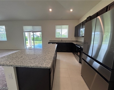 6548 Estero Bay Drive - Photo Thumbnail 3