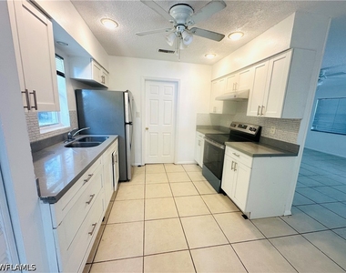 1215 S Alhambra Circle - Photo Thumbnail 5