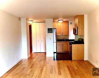 East 36 Street - Photo Thumbnail 2