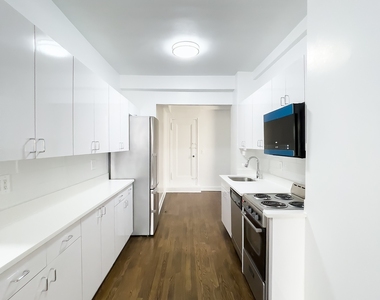 East 37 Street - Photo Thumbnail 2