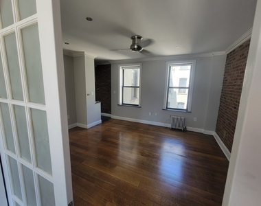 334 East 100th Street - Photo Thumbnail 2
