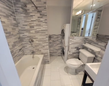 334 East 100th Street - Photo Thumbnail 3