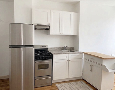 401 East 13th Street - Photo Thumbnail 1