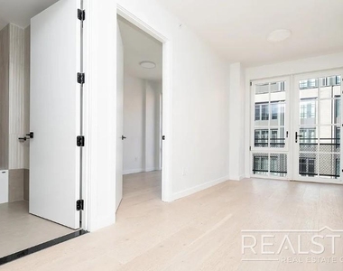 37-25 32nd Street - Photo Thumbnail 6