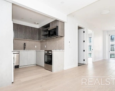 37-25 32nd Street - Photo Thumbnail 2