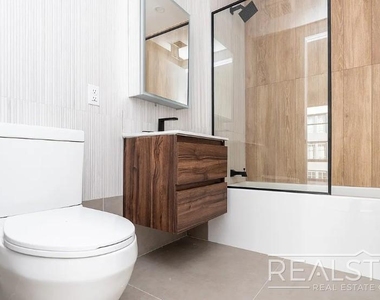 37-25 32nd Street - Photo Thumbnail 15