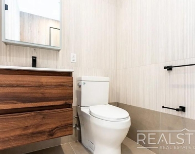37-25 32nd Street - Photo Thumbnail 9