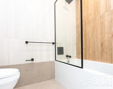 37-25 32nd Street - Photo Thumbnail 8