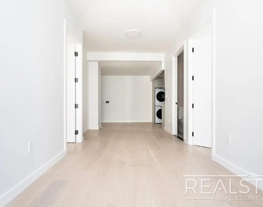 37-25 32nd Street - Photo Thumbnail 4