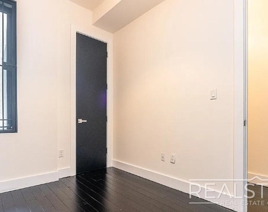 1066 Putnam Ave - Photo Thumbnail 2