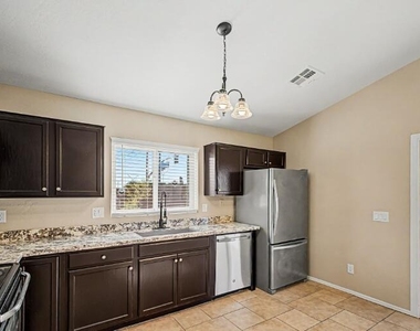 23765 W Desert Bloom Street - Photo Thumbnail 9