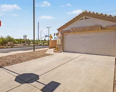 23765 W Desert Bloom Street - Photo Thumbnail 1