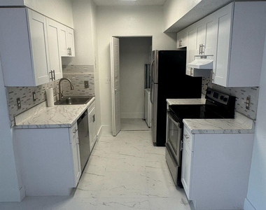 3221 Sabal Palm Manor - Photo Thumbnail 2