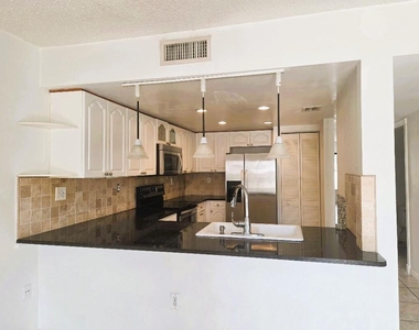 9187 Fontainebleau Boulevard - Photo Thumbnail 2