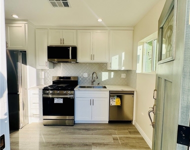 9318 Encino Ave - Photo Thumbnail 1