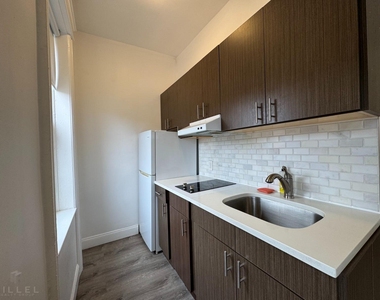 56-56 Myrtle Avenue - Photo Thumbnail 1