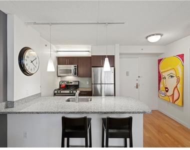555 W 23rd Street - Photo Thumbnail 1