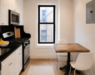 521 W 122nd Street - Photo Thumbnail 1