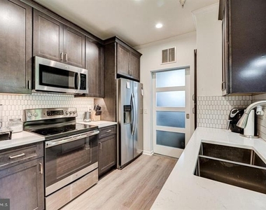 1600 Spring Gate Drive - Photo Thumbnail 2