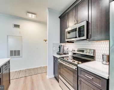 1600 Spring Gate Drive - Photo Thumbnail 3