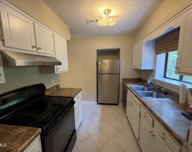5112 Flint Ridge Place - Photo Thumbnail 2