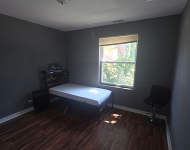 314 E 70th Street - Photo Thumbnail 8