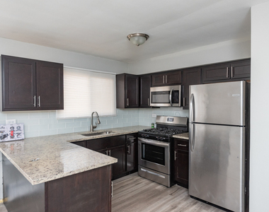 3058 N Kostner Avenue - Photo Thumbnail 1