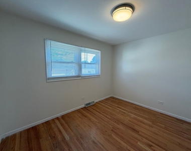 9713 River Street - Photo Thumbnail 8