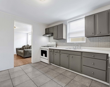 465 W 27th Street - Photo Thumbnail 8