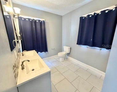 305 W 9th Street - Photo Thumbnail 22